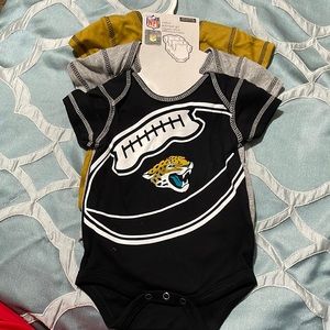 Three pack of baby onesies